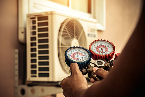 Professional Heat Pump Repair technician working in Lawrenceville, VA